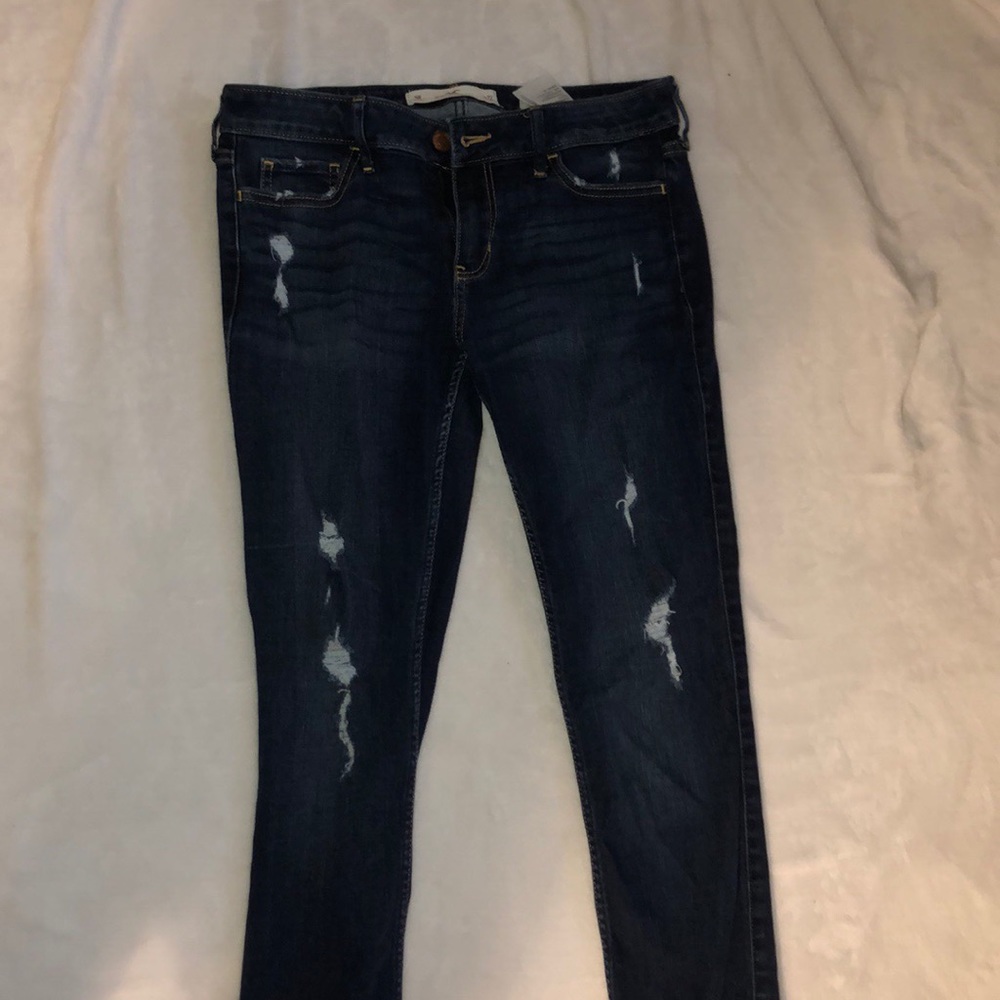 Lightly ripped denim jeans